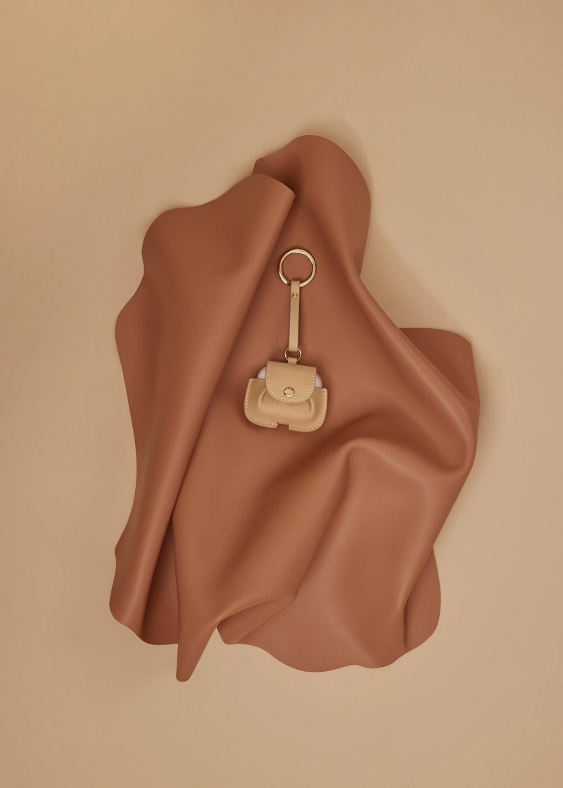 Polène Airpods case Charms Brune | UQJART096